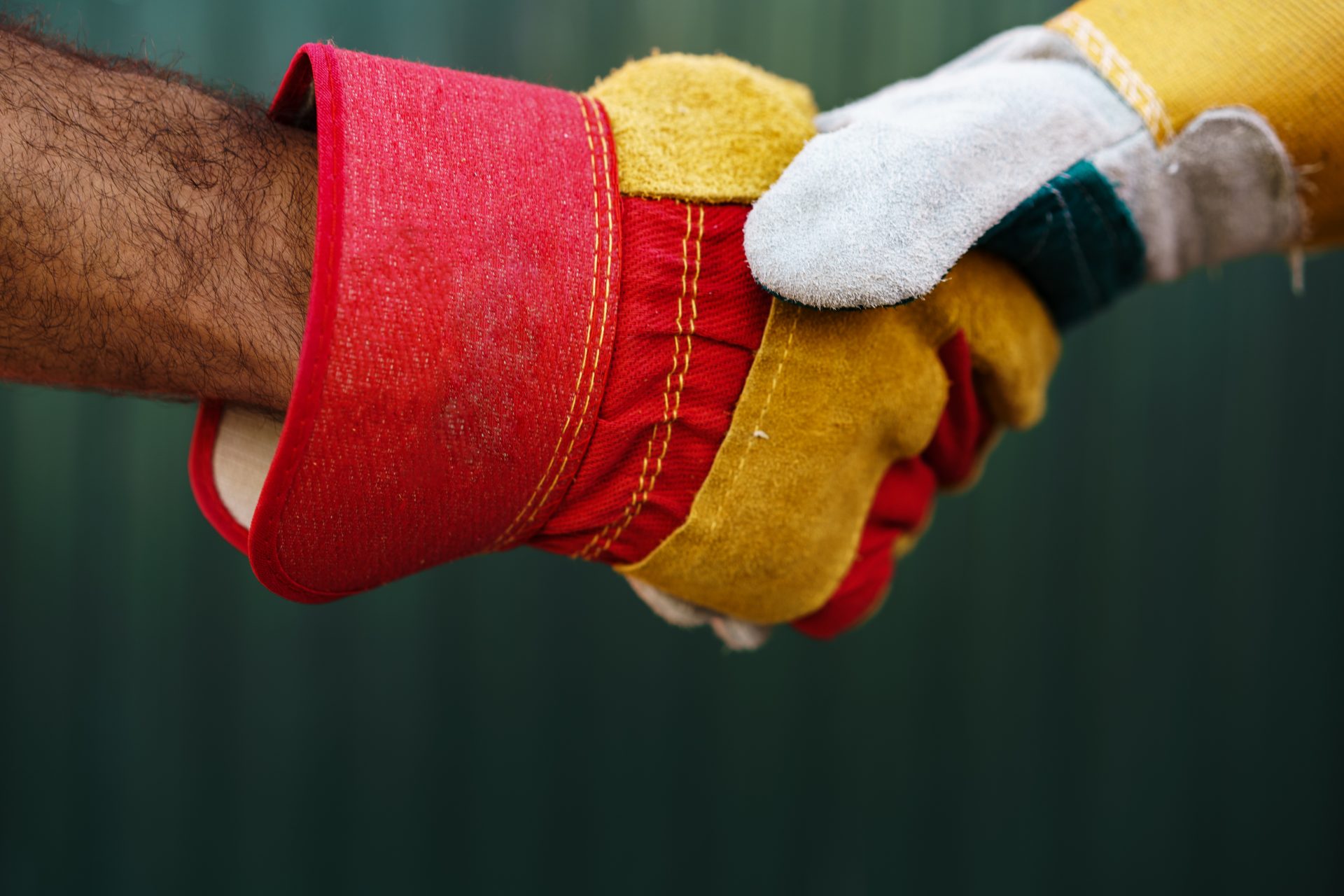 close up photo of two men builders in workwear sha 2025 02 24 14 46 46 utc