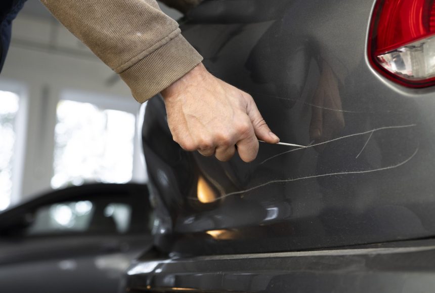 a man with a screwdriver in his hand scratches the 2024 11 28 11 49 15 utc