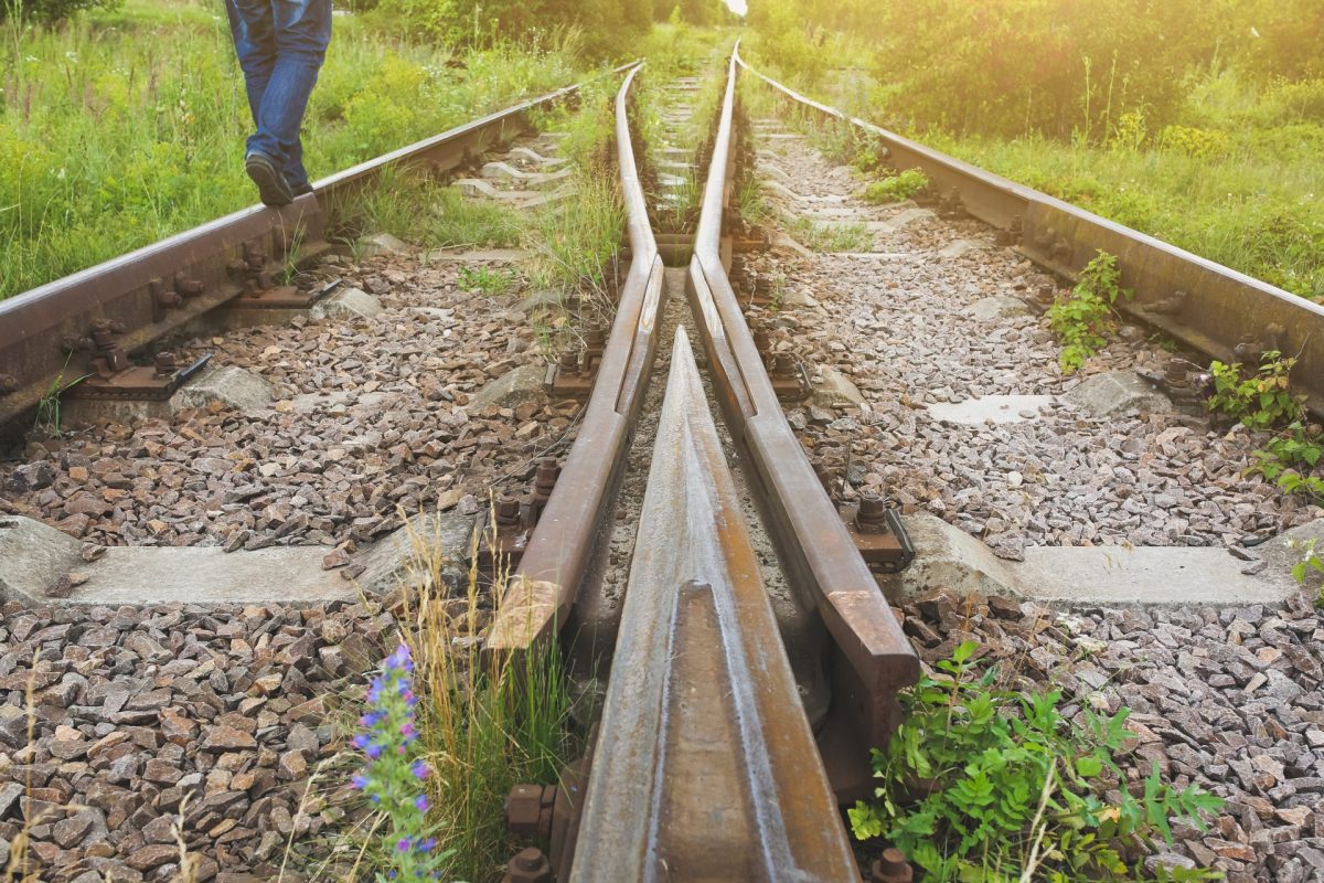 man is standing on old rusty railway lines with gr 2025 10 14 09 41 38 utc