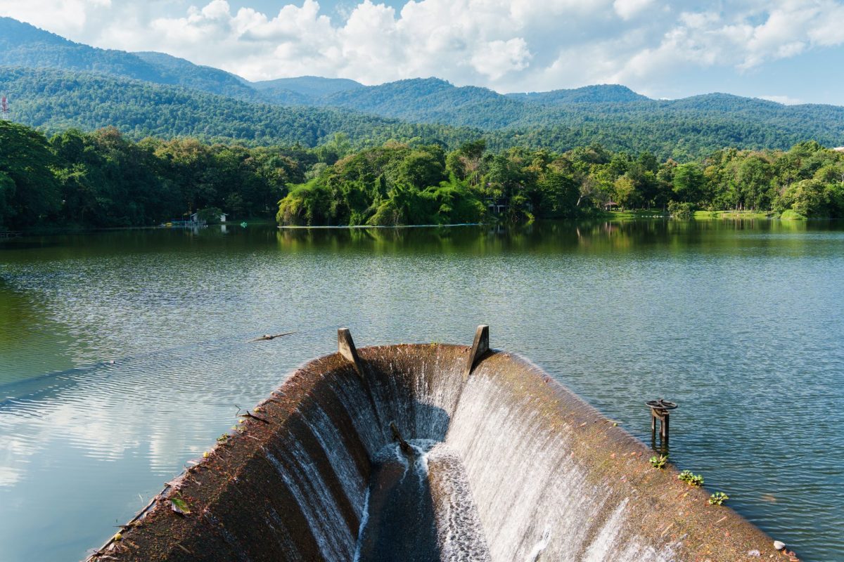 reservoir flowing with tropical forest and blue sk 2025 06 05 22 32 43 utc