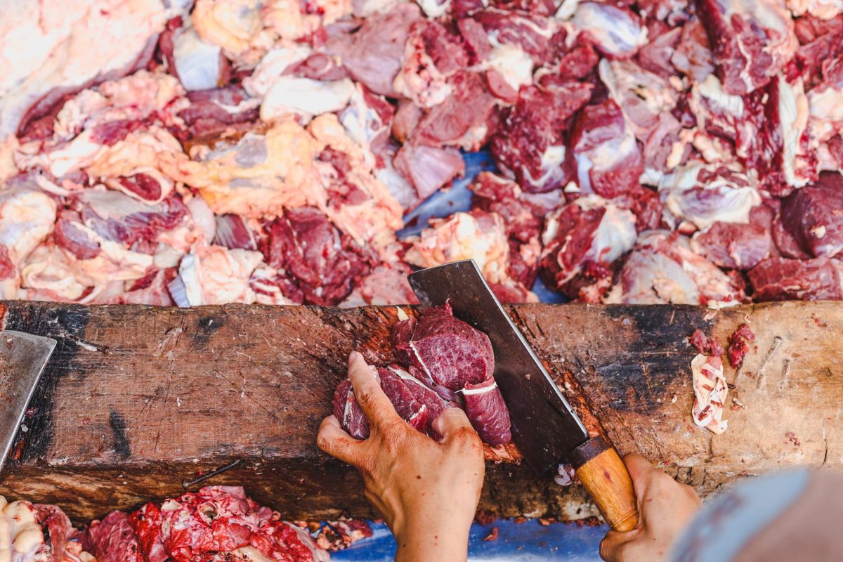 butcher hand cutting meat 2025 01 28 01 23 12 utc