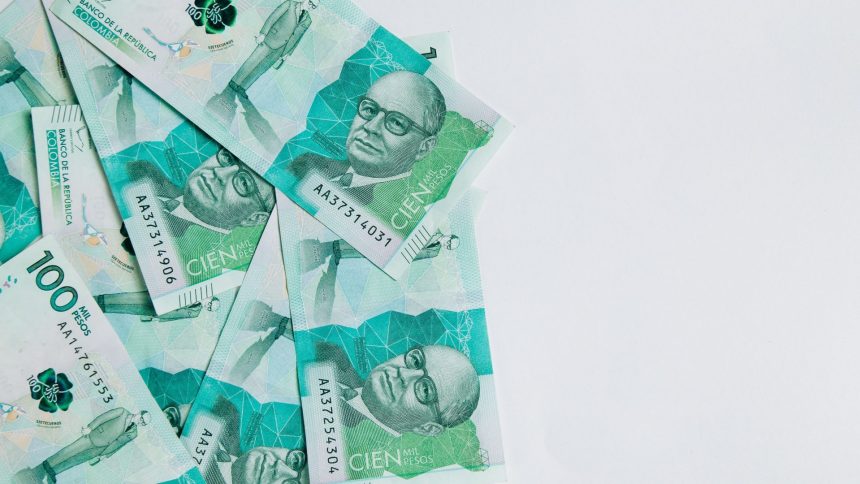 colombian money one hundred thousand pesos on whi 2025 02 11 23 49 07 utc