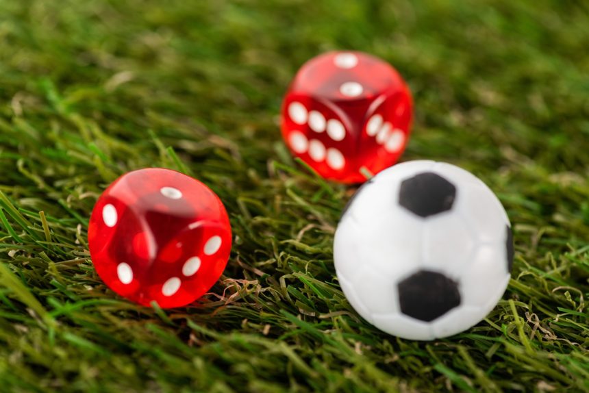 selective focus of dice and toy soccer ball on gre 2026 01 05 23 56 56 utc