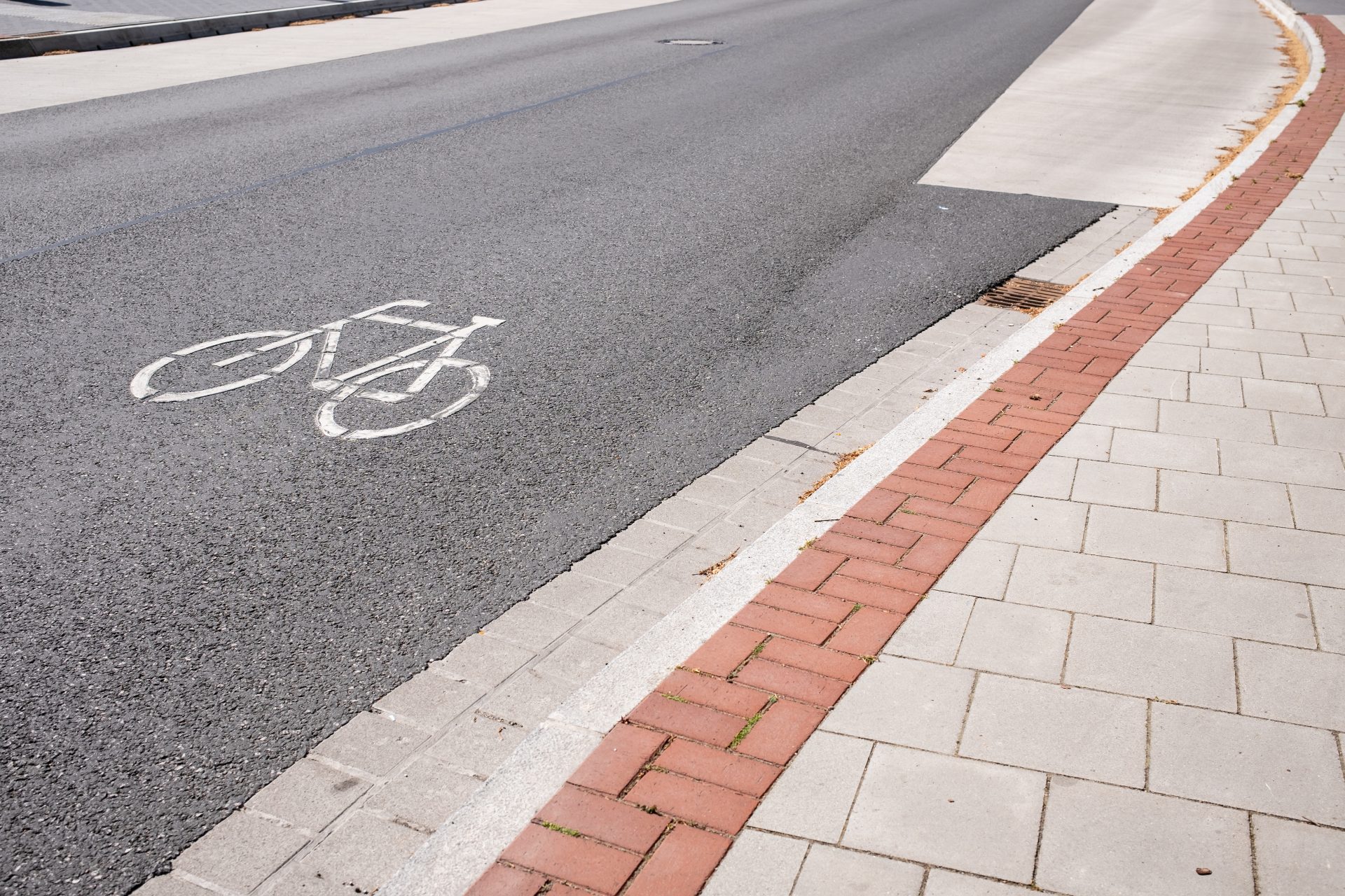 sign printed on the road allowing cycling next to 2026 01 07 01 36 04 utc