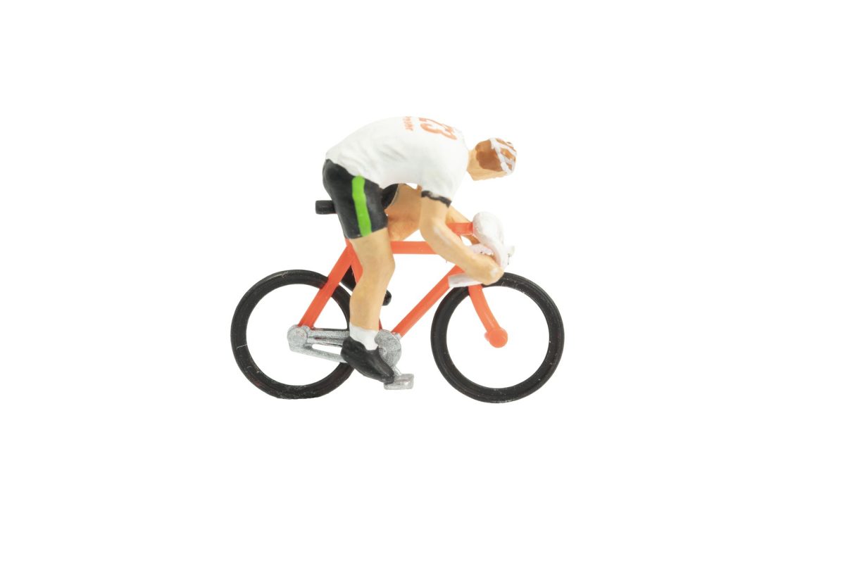 miniature adult figurine on bike with racing jerse 2026 03 20 20 06 55 utc