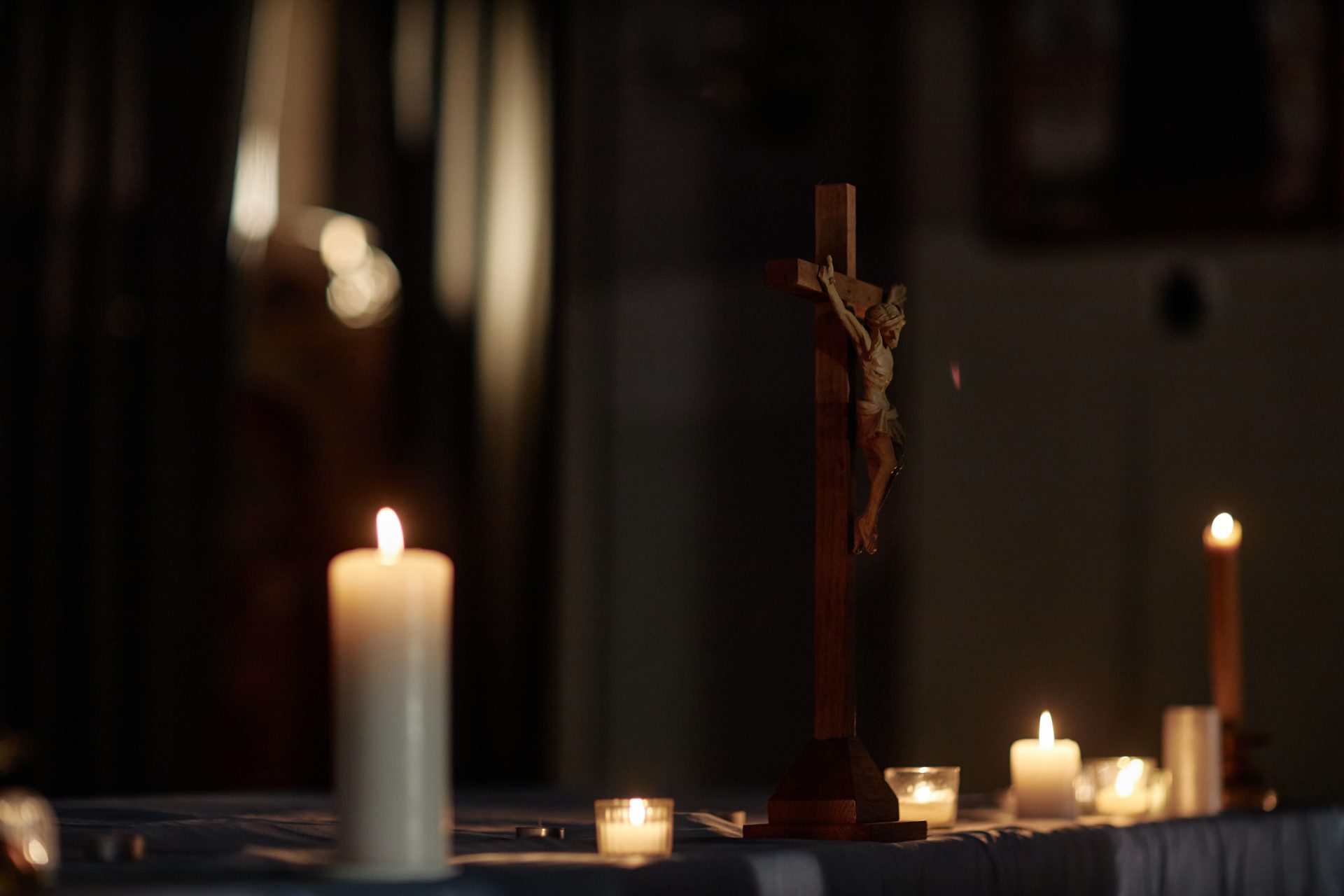 statue of jesus christ standing on table with cand 2026 03 19 23 01 43 utc