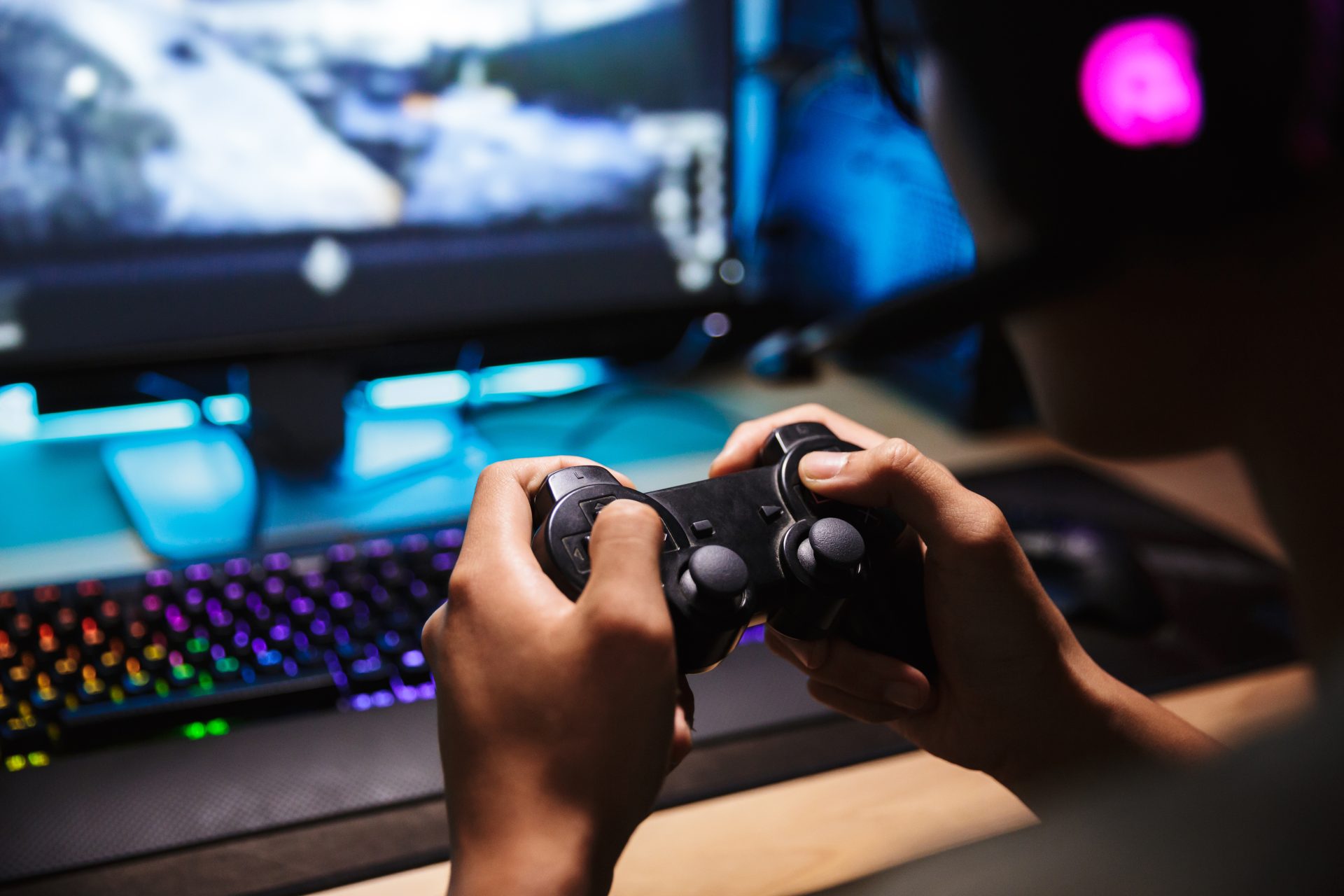 hands hold game controller while gaming at home 2026 01 09 14 54 21 utc