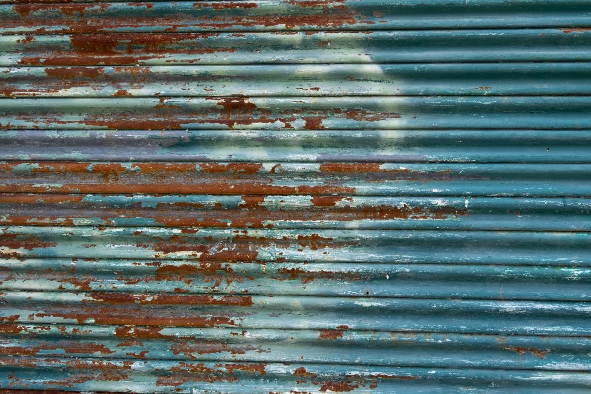 rusting metal door with weathered blue paint 2026 01 08 00 27 10 utc